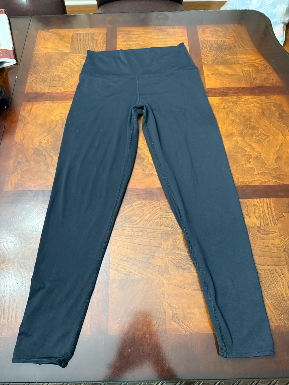 Aerie/offline black leggings with a crisscross design on the bottom